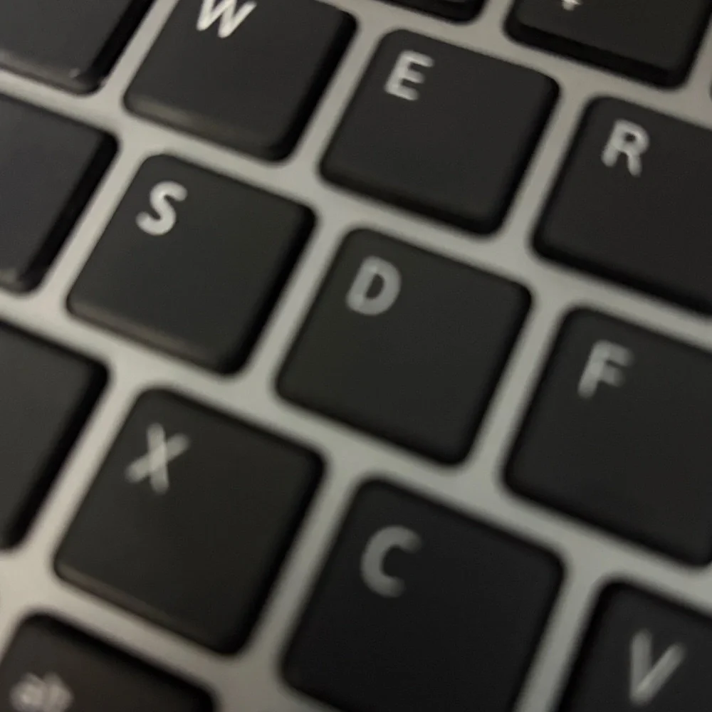 Sleek Black and Silver Laptop Keyboard